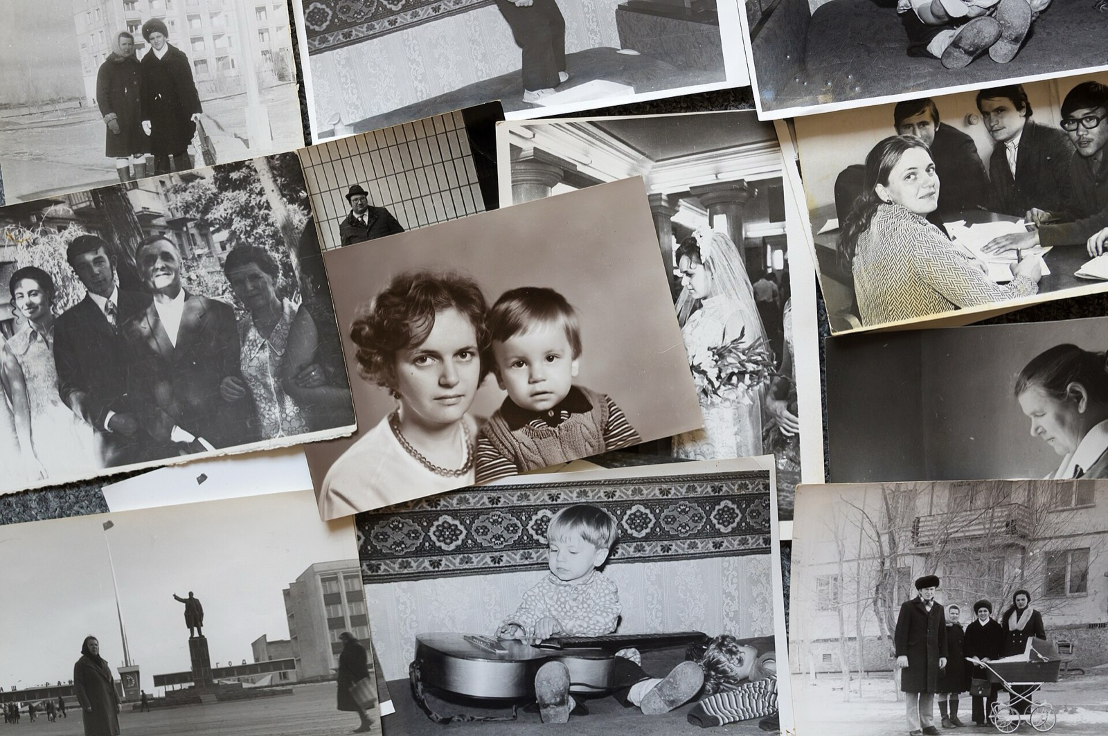 Printed photographs spread on a table