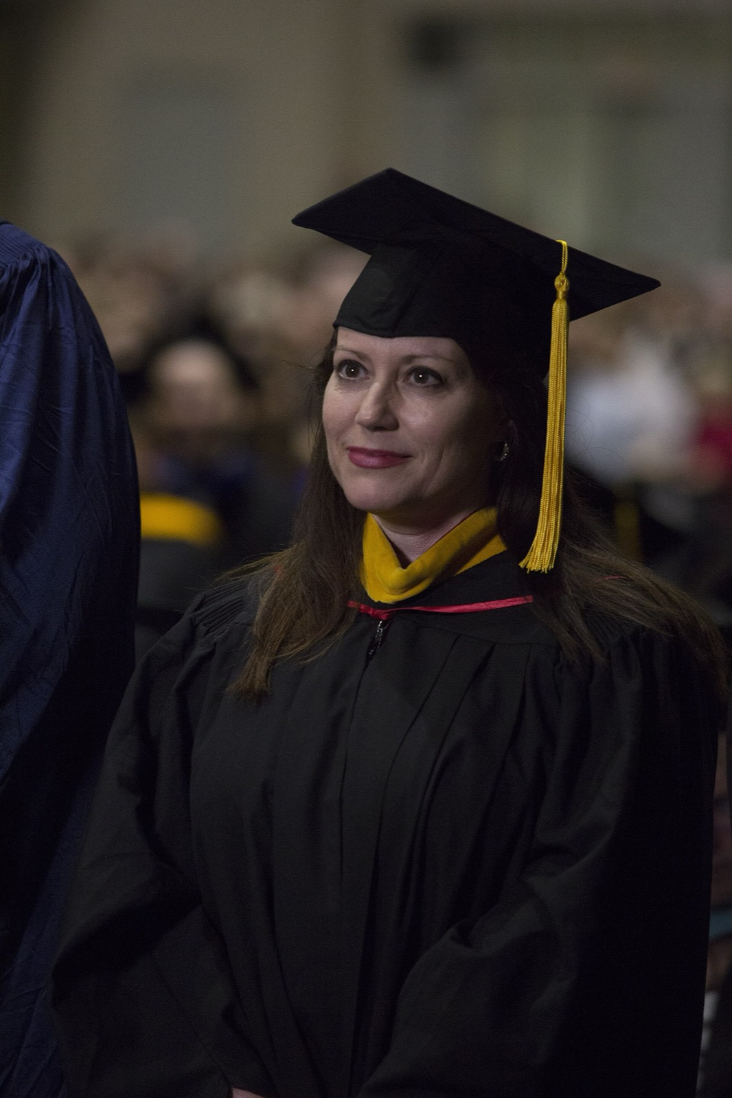Graduate portrait with gold tassel